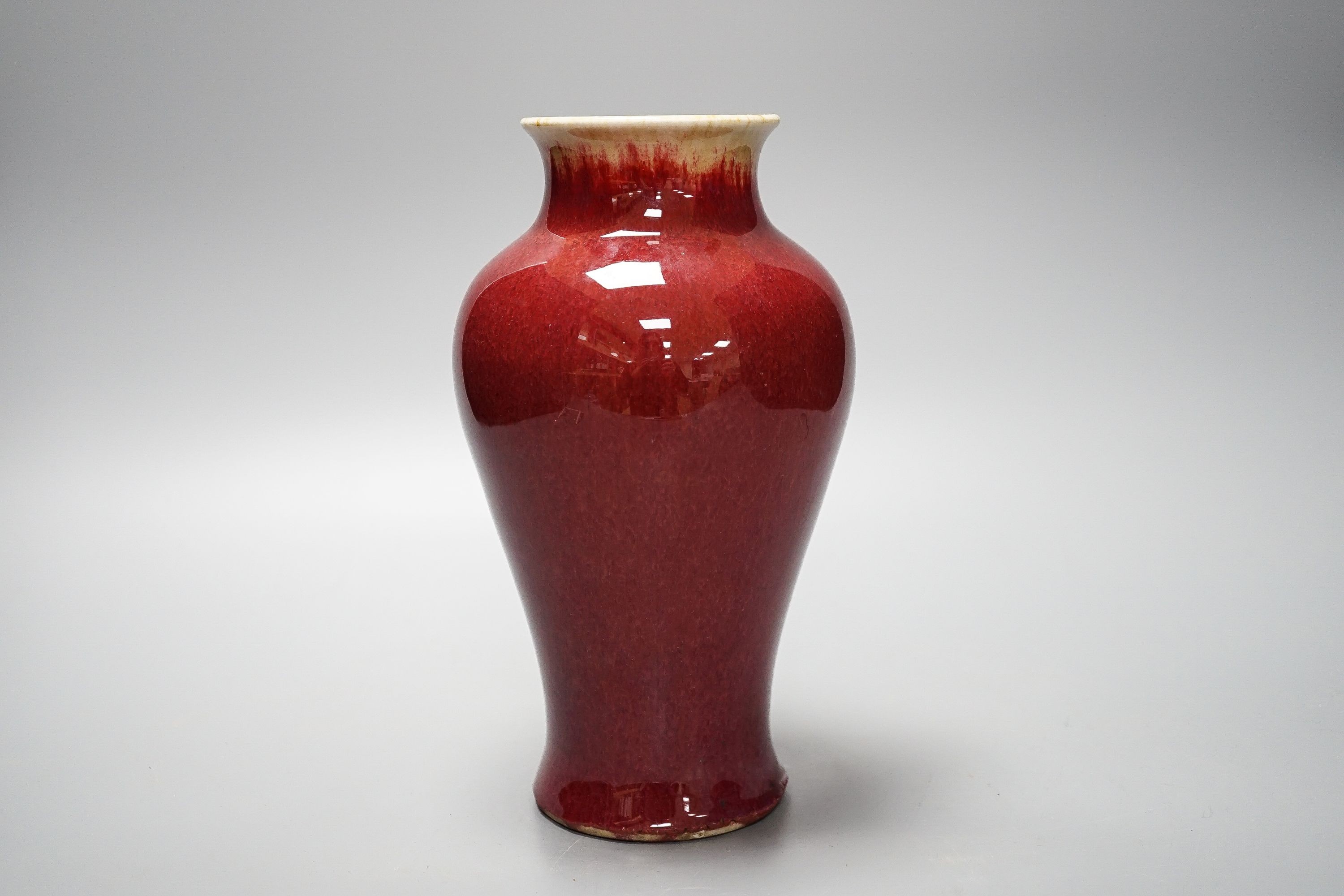 A Chinese sang de boeuf glazed vase 22cm